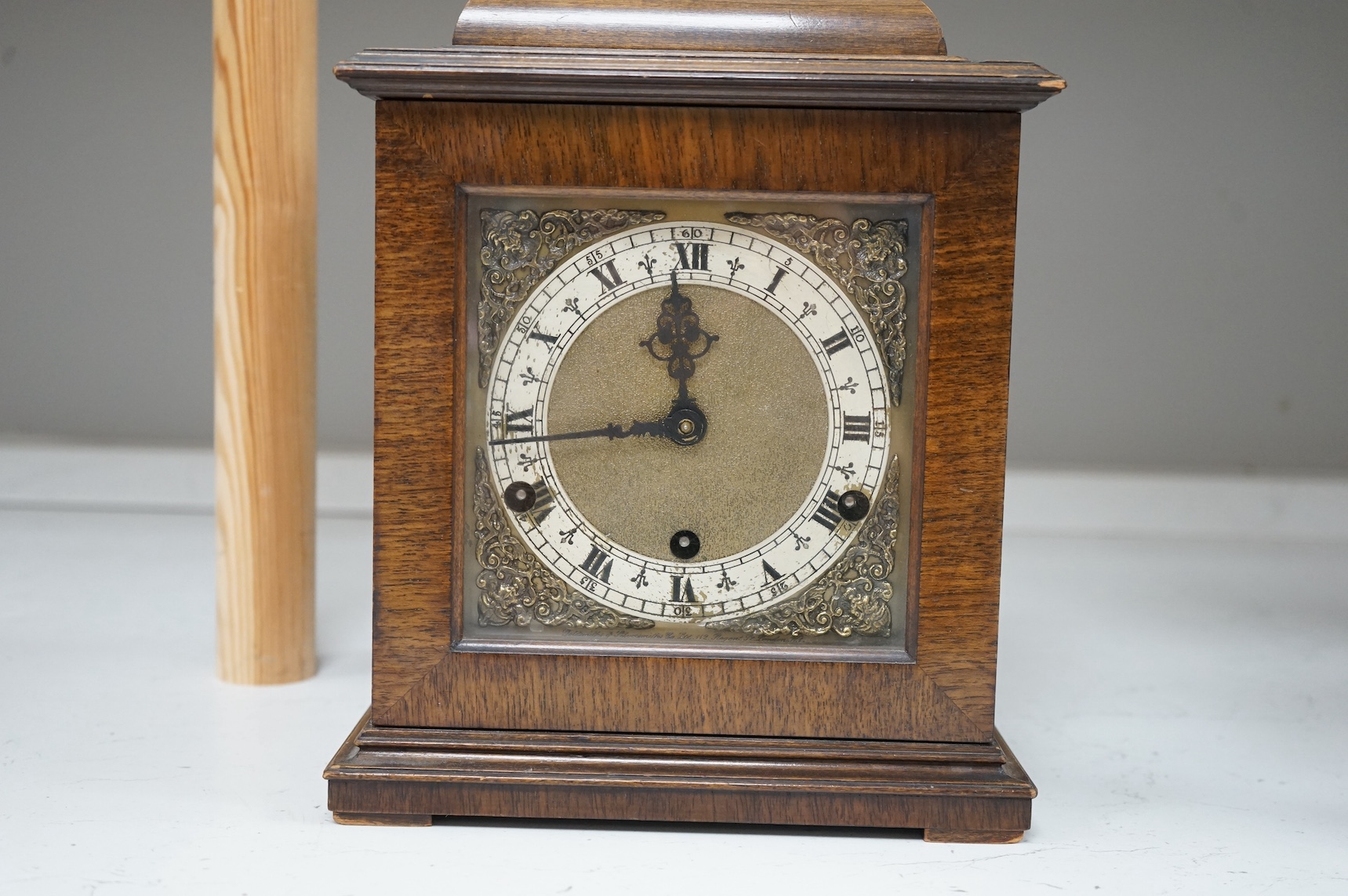 An Edwardian walnut mantel clock with musical chime, 29cm. Condition - good, not tested